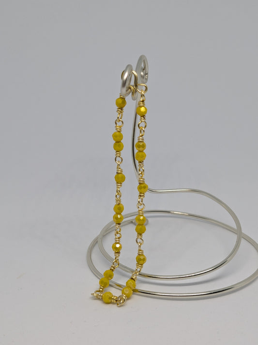 Elegantes Glieder-Armband in Hellgold mit geschliffenen gelben Glasperlen